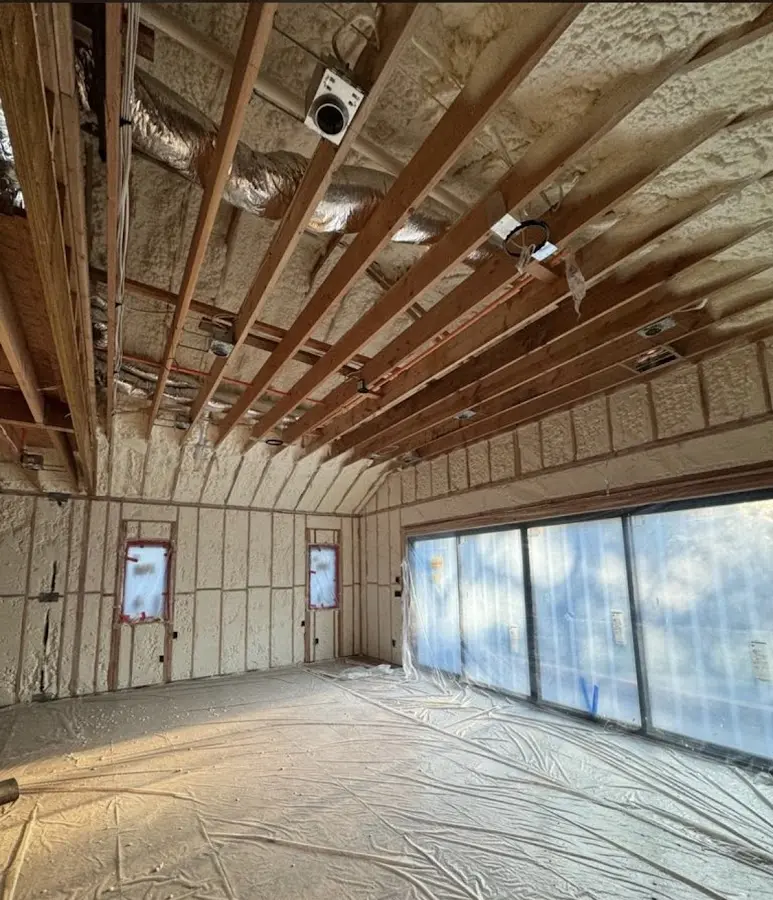 Interior walls and ceiling insulated with spray foam during new construction in Grants Pass